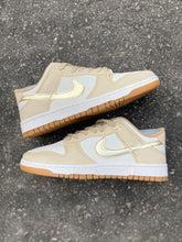 Tênis Nike Dunk Low "Dourado"